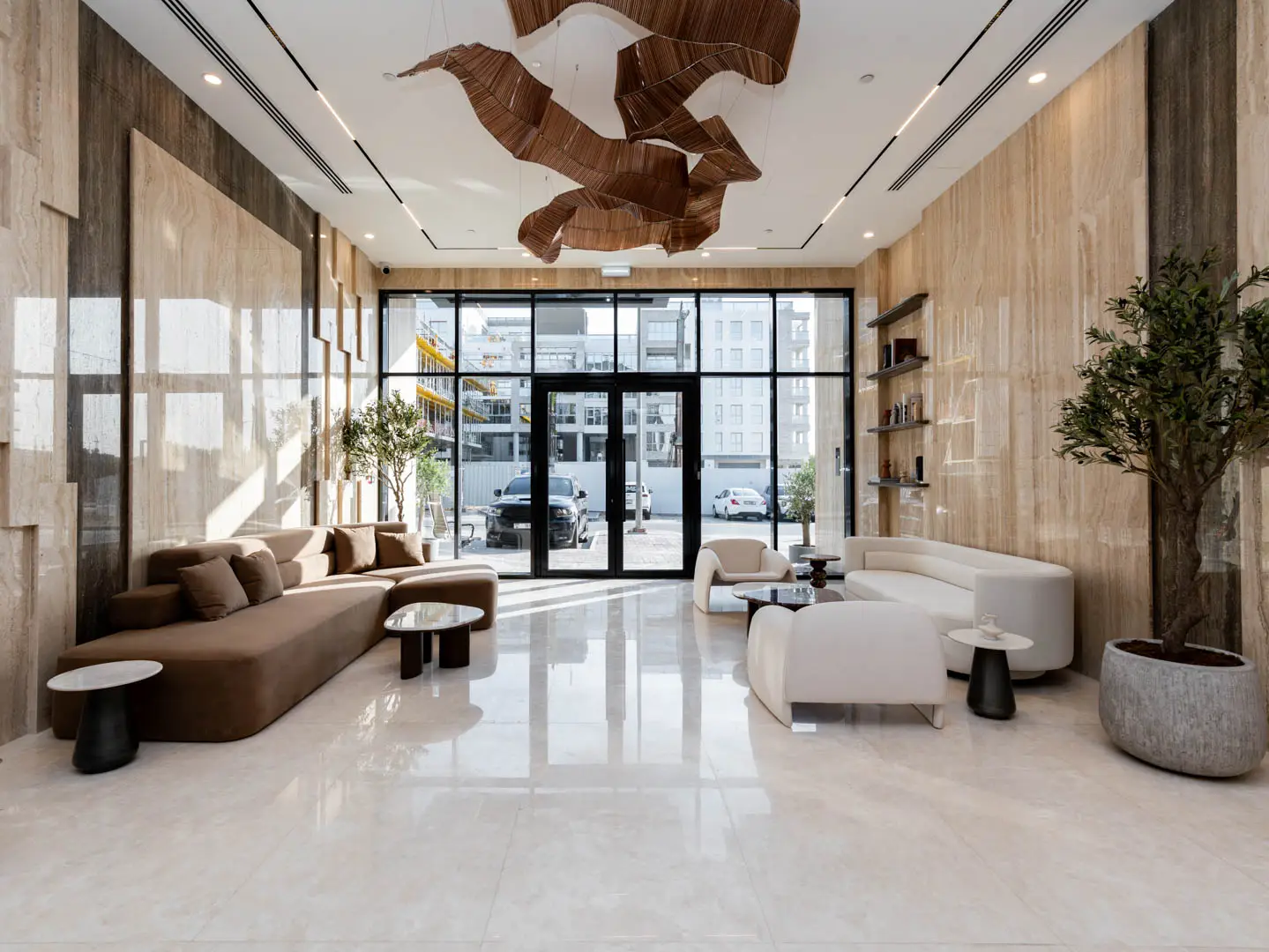 Modern apartment lobby showcasing high-end interior design and refined architectural details